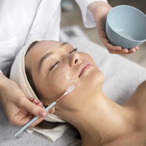 high angle woman getting massaged spa