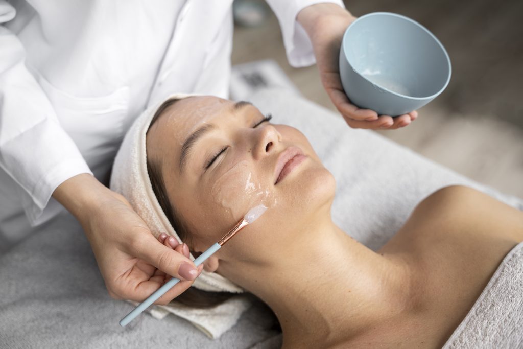 high angle woman getting massaged spa